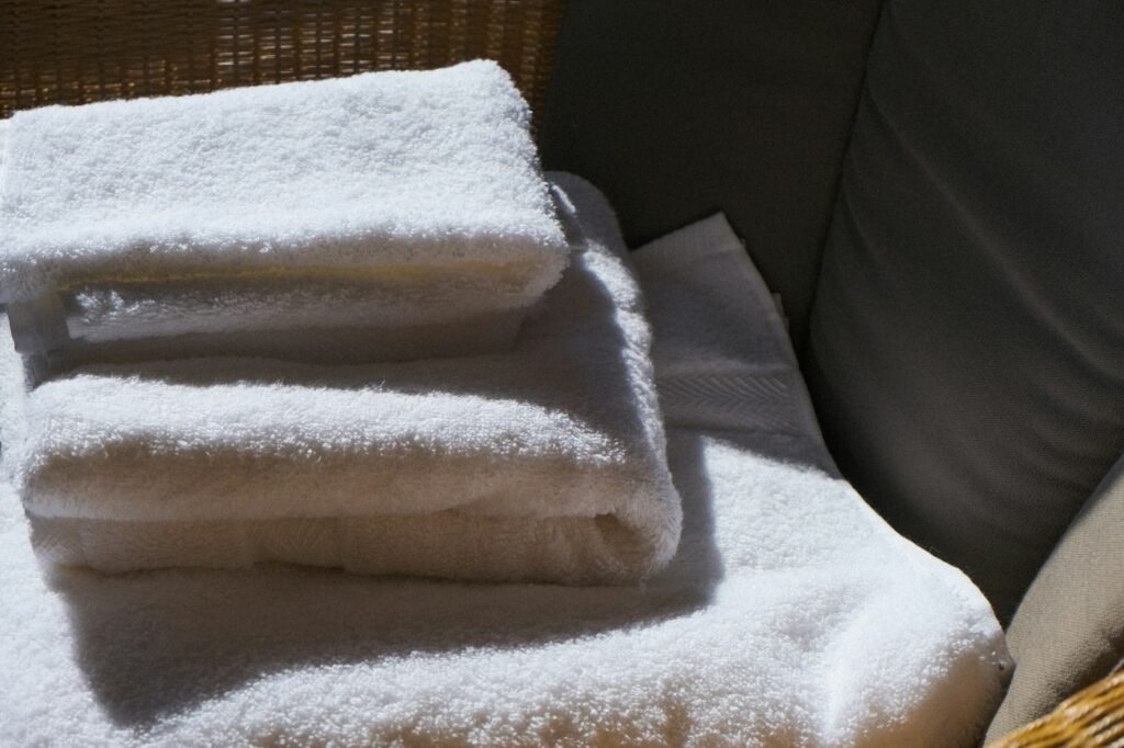 Stack of folded white cotton towels